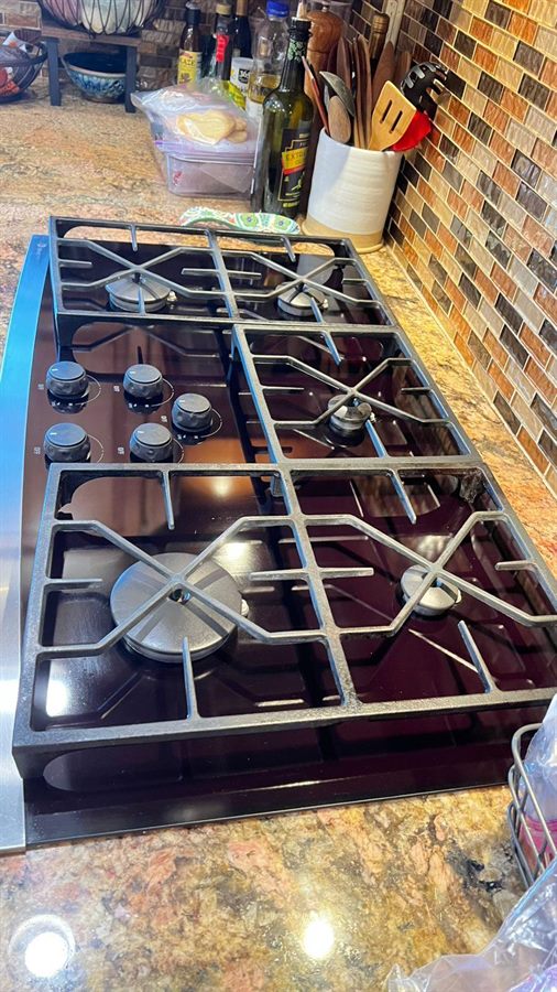 Cleaned stovetop after a Total Care Cleaning visit